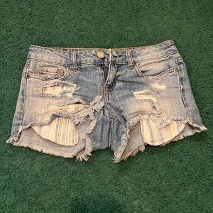 Distressed denim booty shorts
